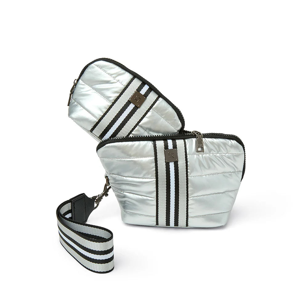 Think Royln double stash cosmetic bag with sleek black exterior and compact design, ideal for organizing beauty essentials.