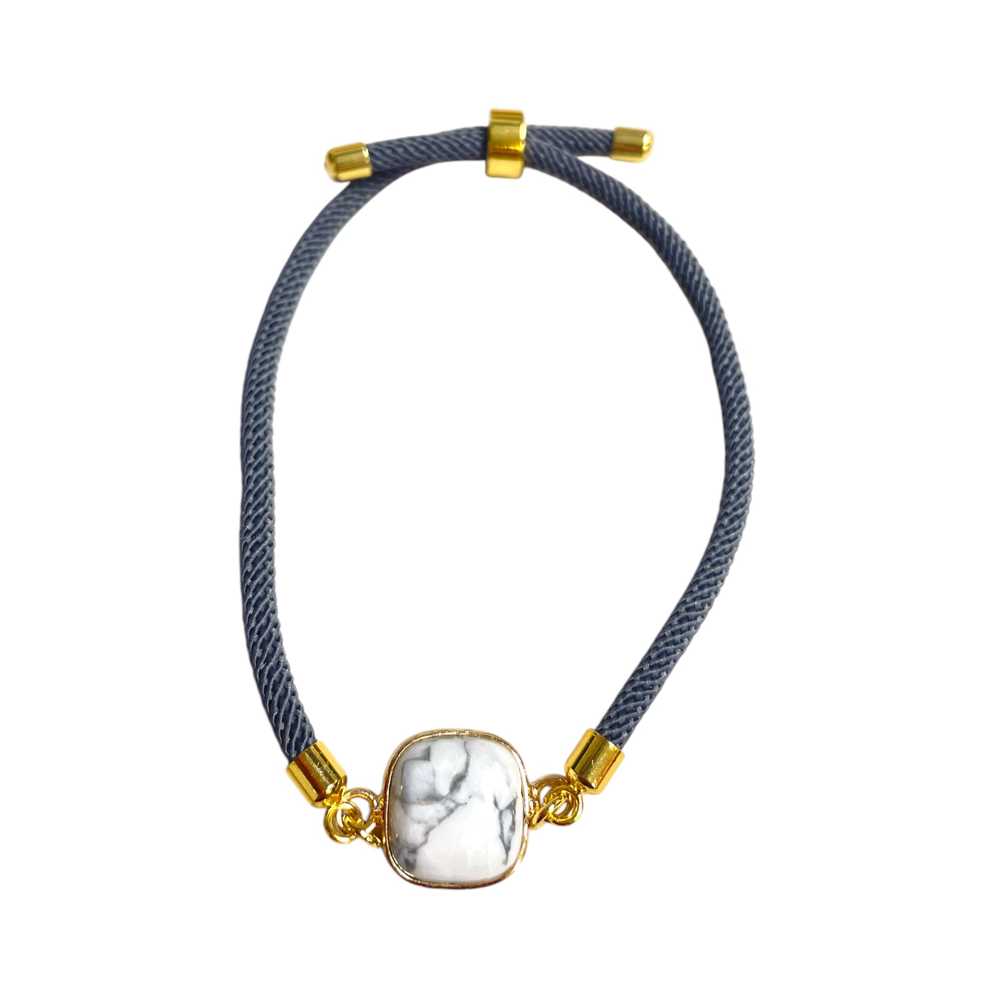 Brenda Perruzza Jewelry rope pulley bracelet with adjustable cord and metal accents, stylish and casual accessory.