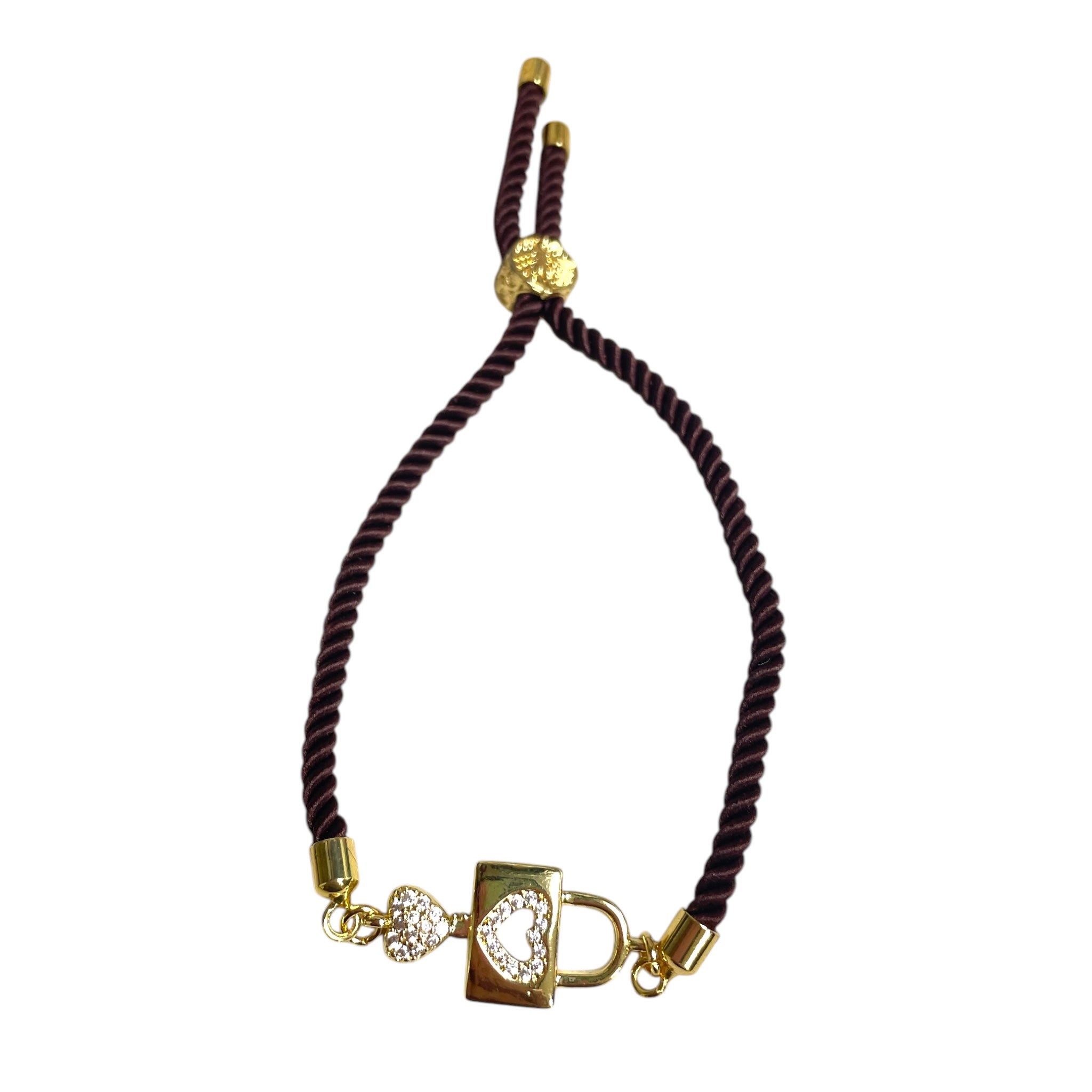 Brenda Perruzza Jewelry rope pulley bracelet with adjustable cord and decorative metal accents on natural fiber cord.