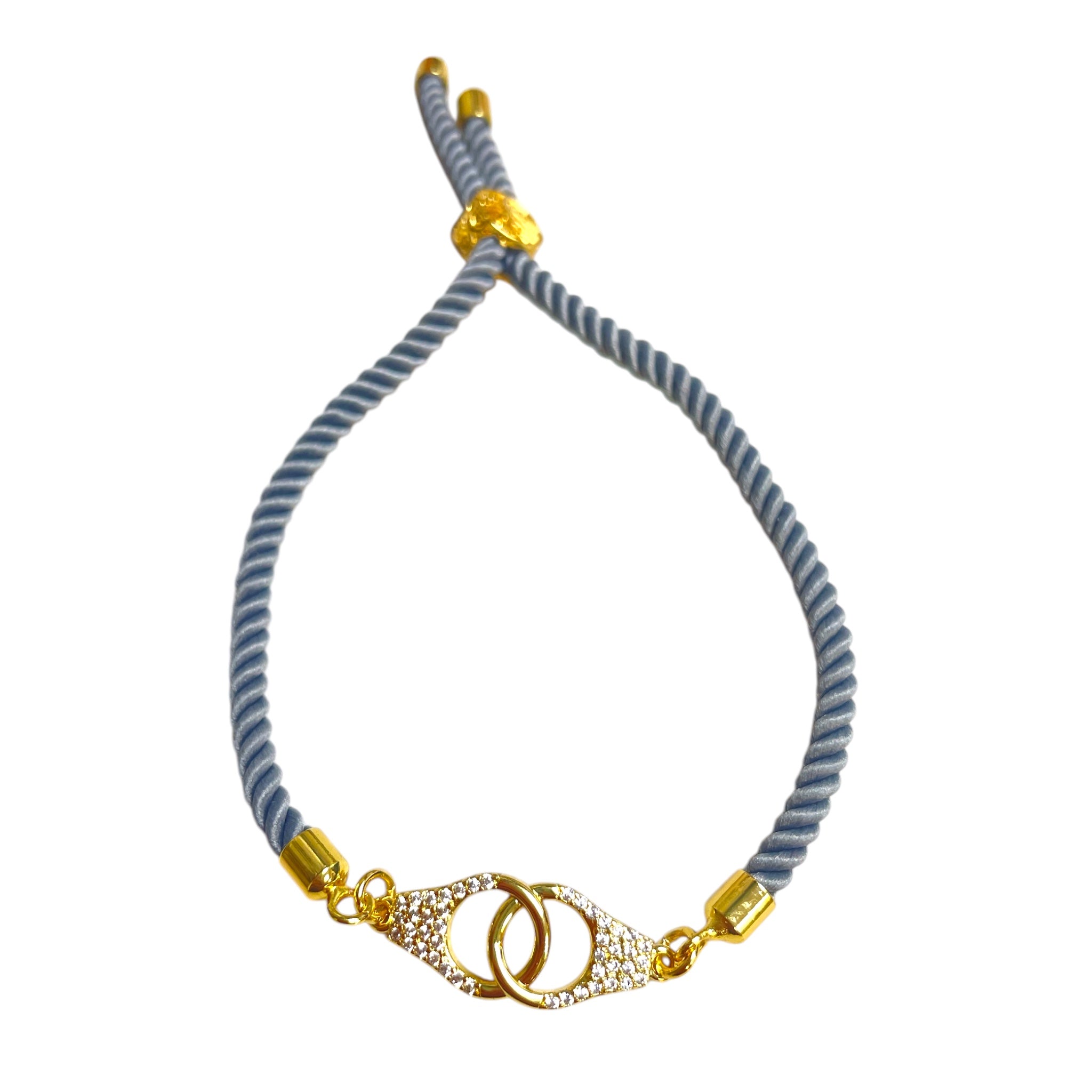 Brenda Perruzza Jewelry rope pulley bracelet featuring braided cord and adjustable sliding mechanism for a stylish look.