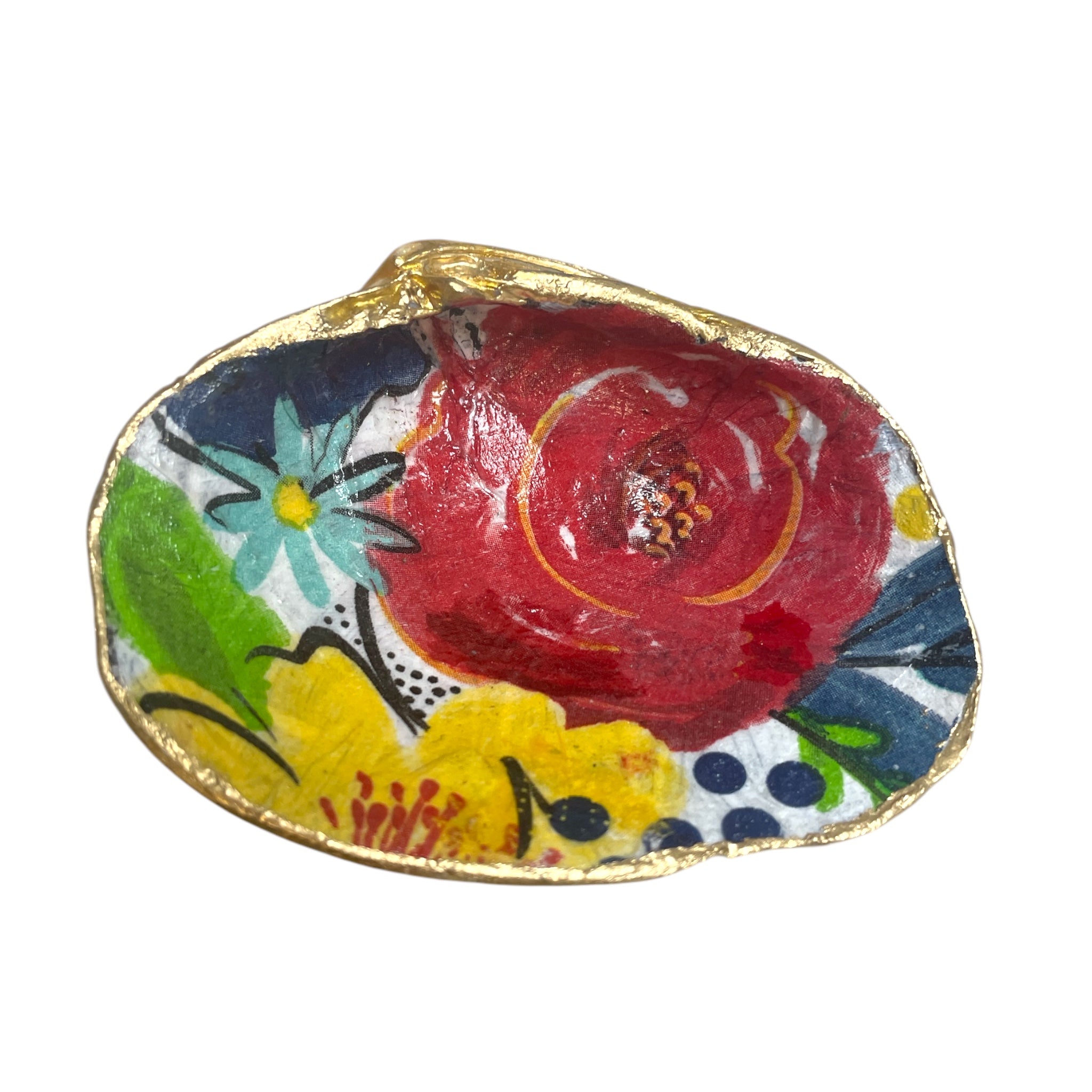 Colorful decoupage shells arranged as decorative items for home decor by a private label brand.