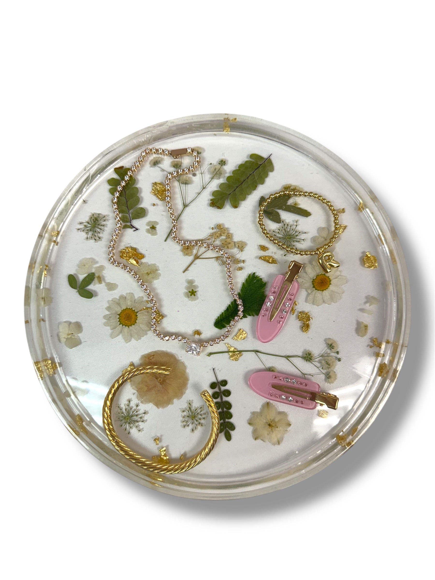 Large round serving tray by kraftz featuring a clear design with white floral accents.