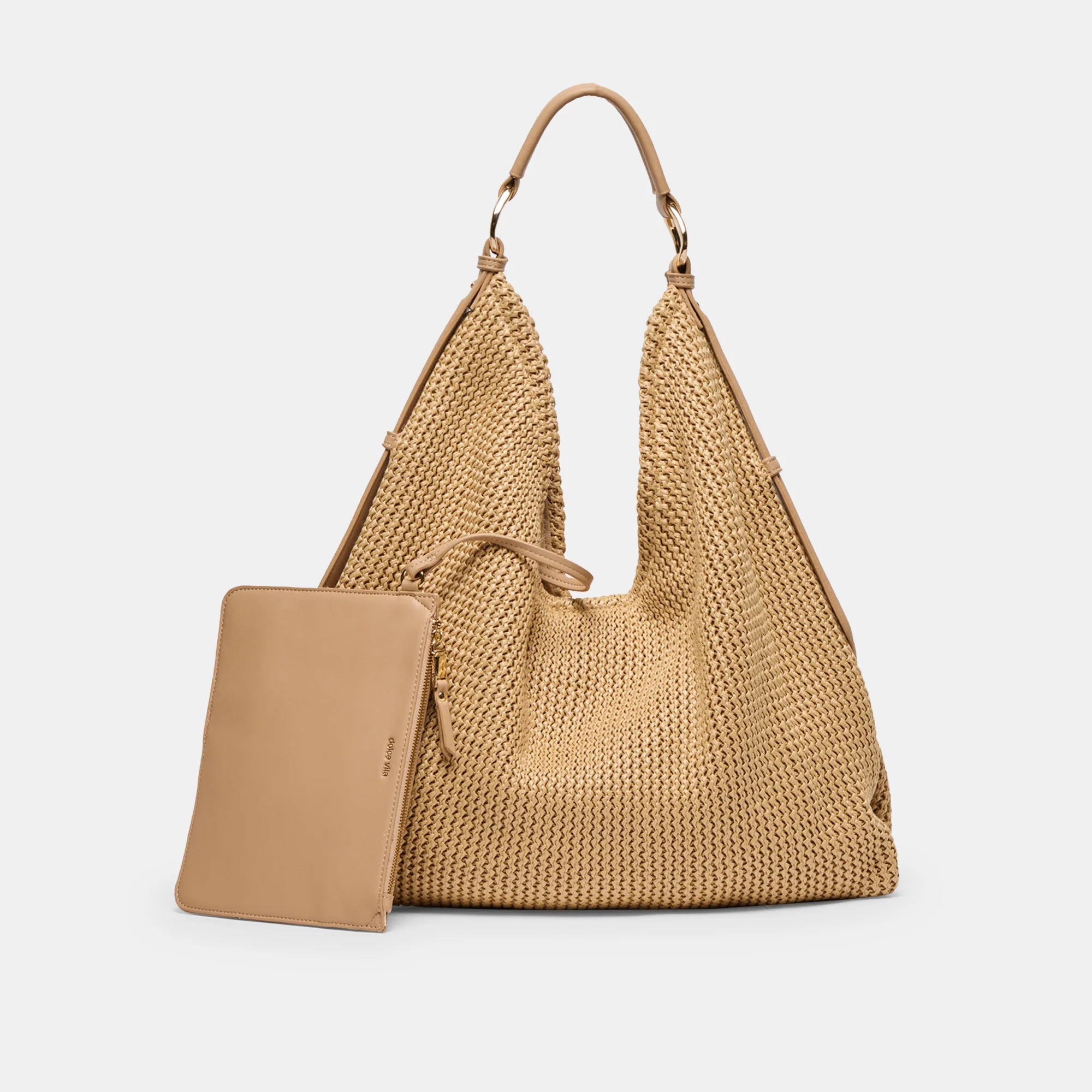 Dolce Vita Miriel Tote bag made of natural raffia with a spacious design and woven texture, shown with a pocket detail.