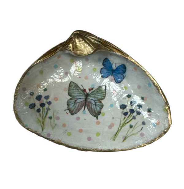 Decorative decoupage shells in various colors and patterns, ideal for home decor and craft projects.