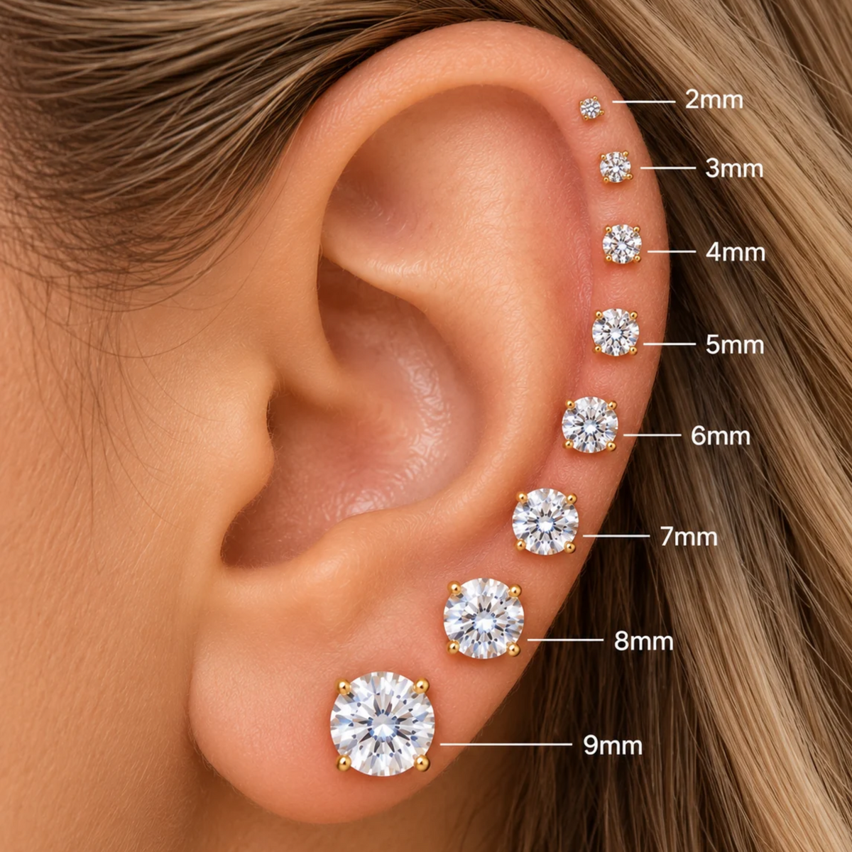 Let's Bag It simple round sterling silver gold studs earrings on a plain background