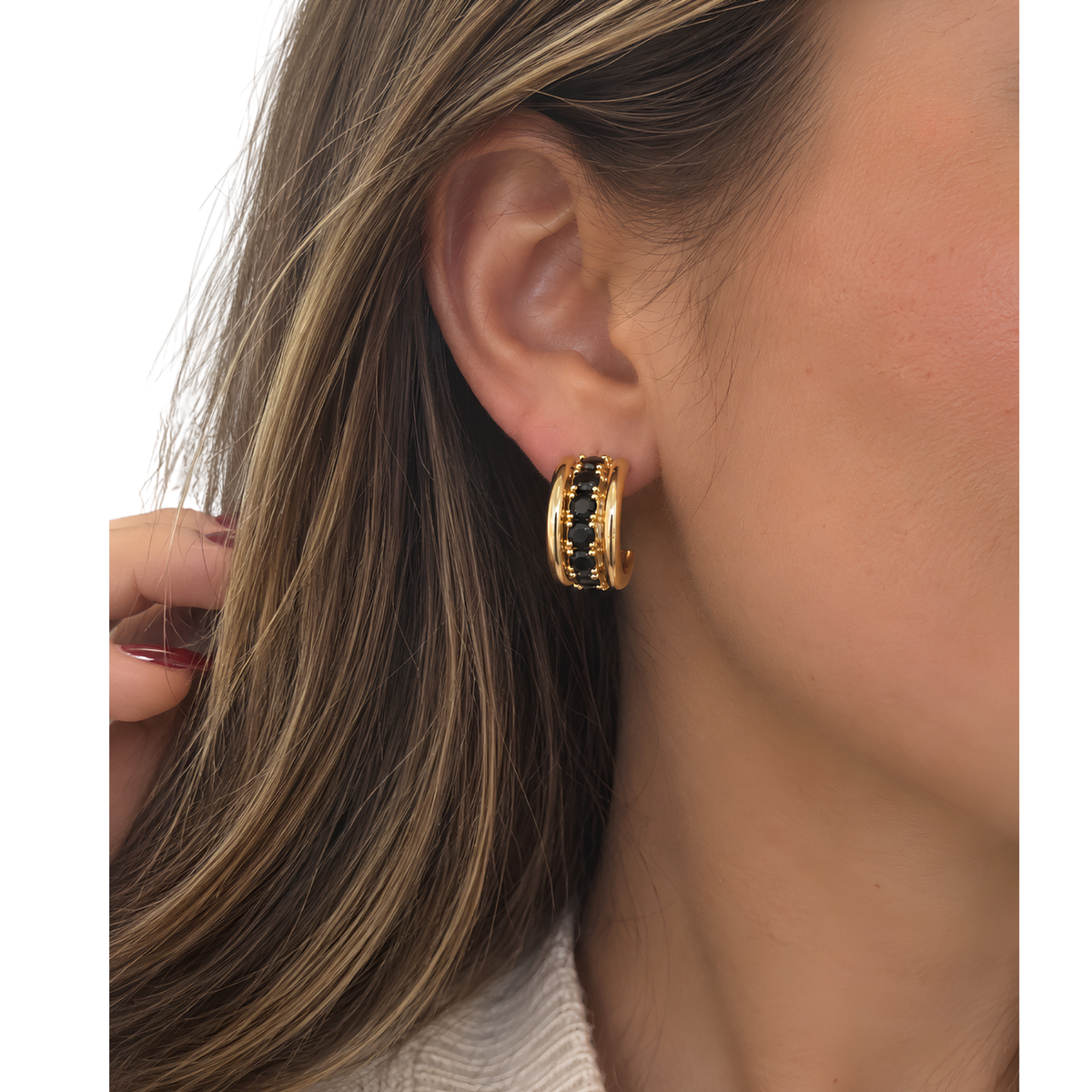 Black "Oh She Fancy" diamond hoop earrings by Melinda Maria, featuring smooth and textured finishes.
