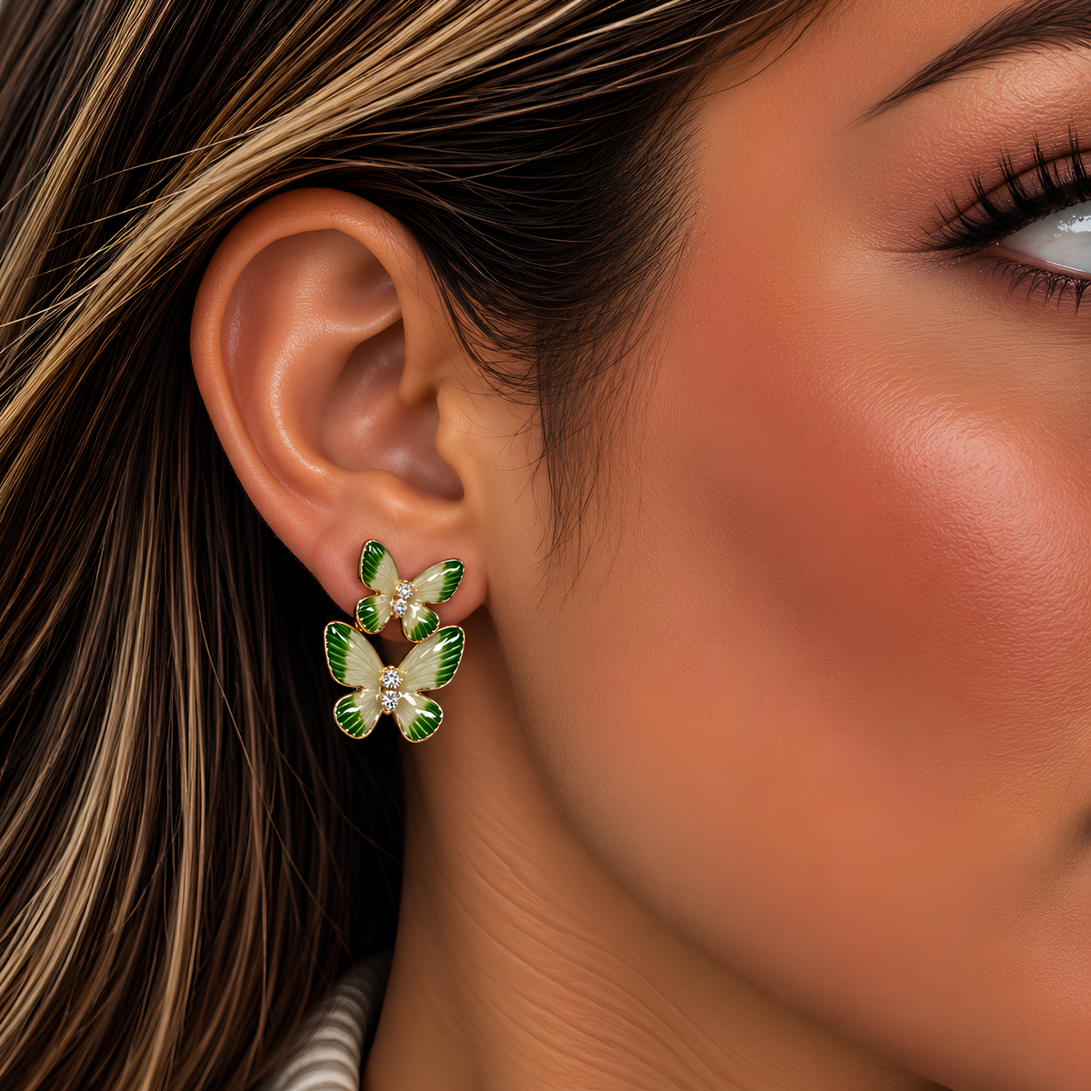 Colorful butterfly enamel earrings with gold trim and double butterfly studs, featuring vibrant, detailed butterfly designs.