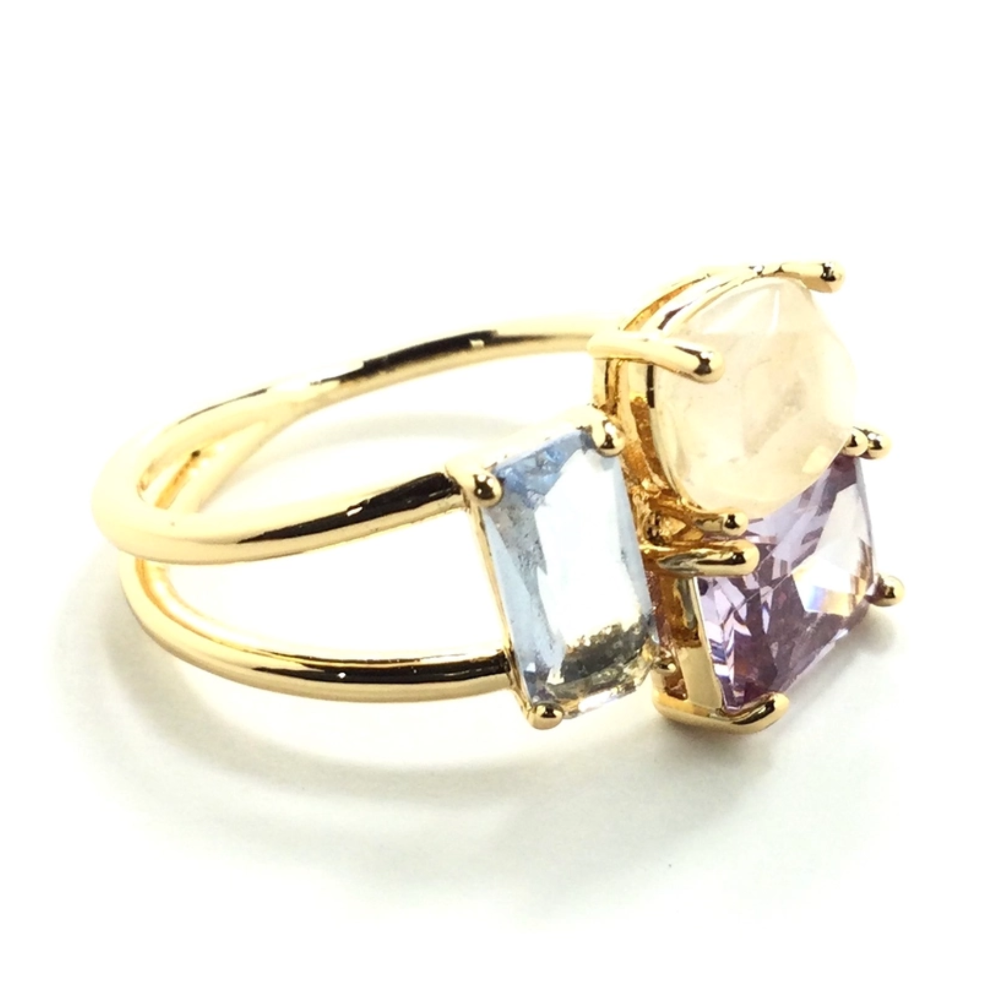 Triple crown ring by Private Label featuring intricate design and sparkling stones, displayed on a neutral background.