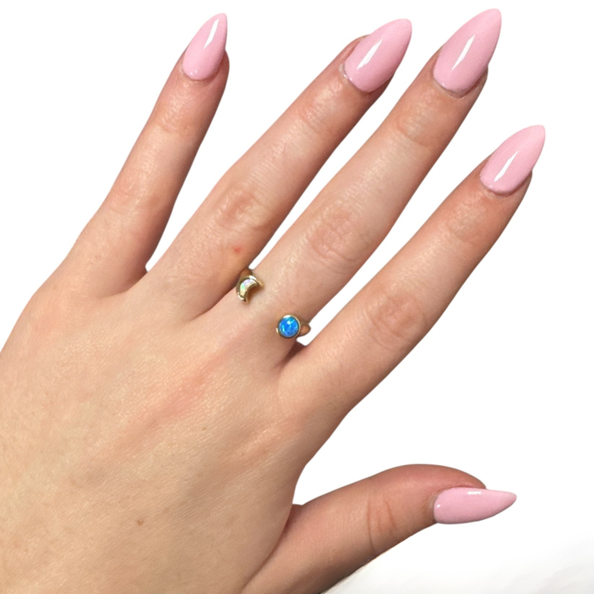 Moon opal ring by Private Label featuring a luminous opal stone set in a sleek metal band.