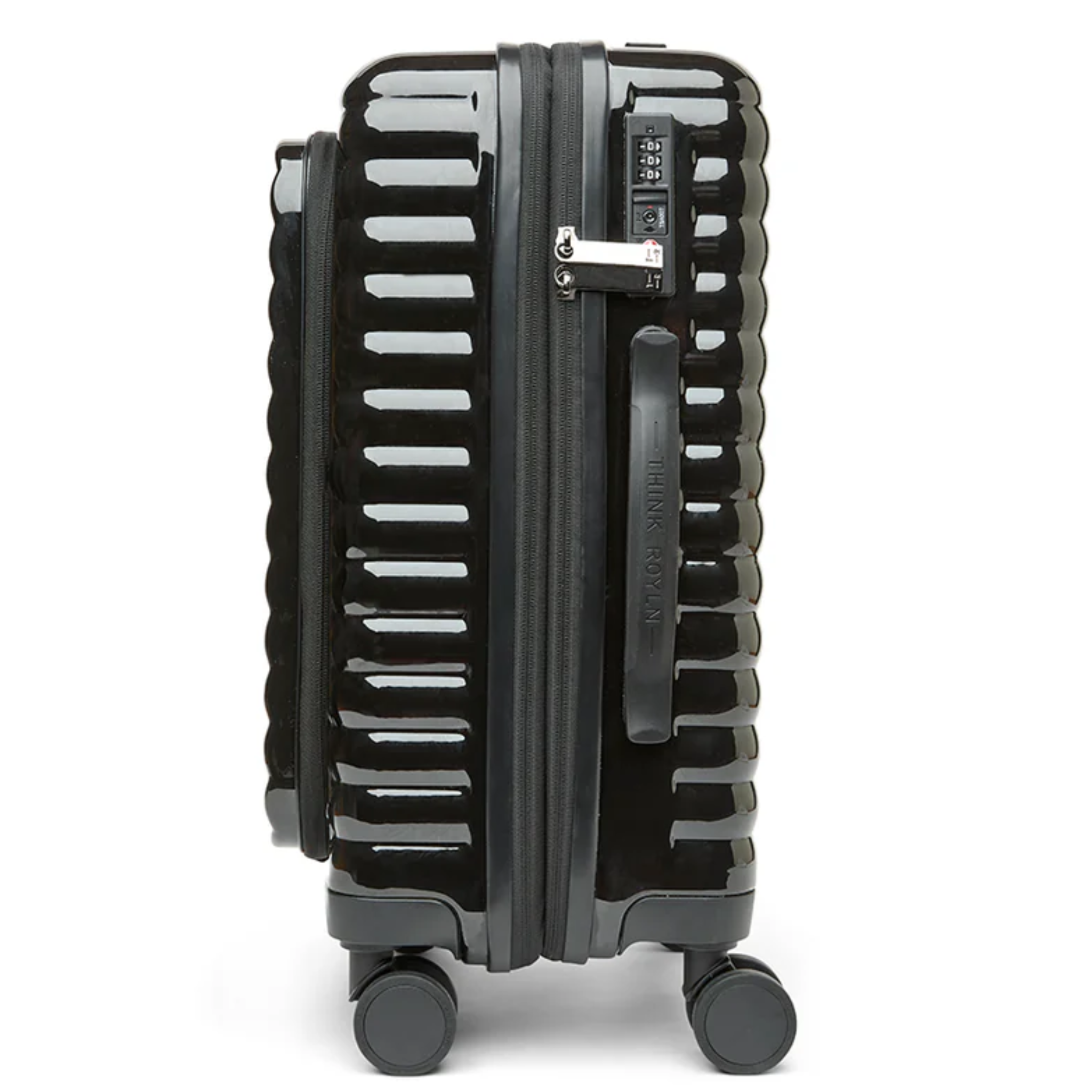 Think Royln Accomplice travel suitcase with durable handle, spacious interior, and sleek design for adventure-ready packing.