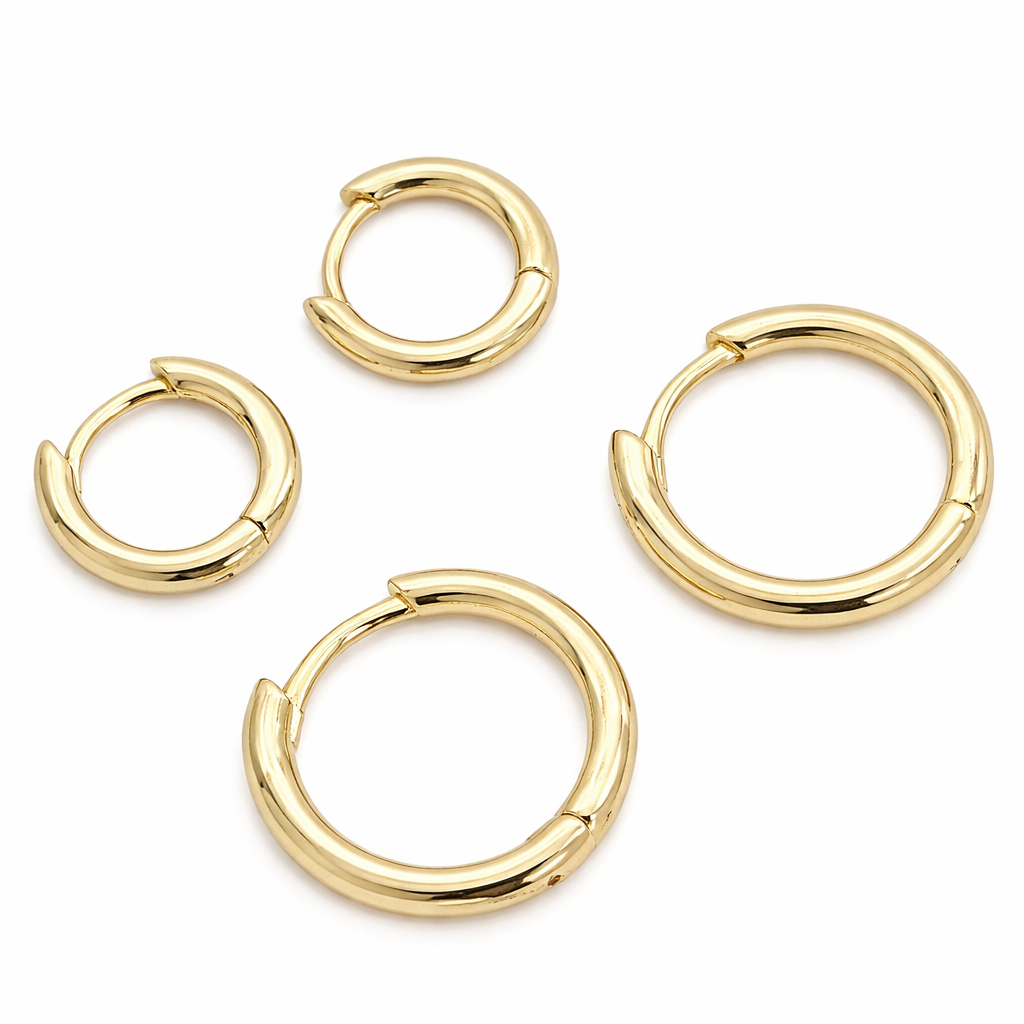 Private label minimalist huggie hoop earrings, small gold-toned jewelry with sleek, simple design for everyday wear