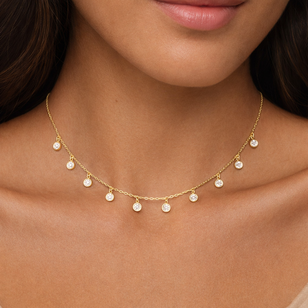 Gold CZ circle droplet necklace crafted in Sterling Silver 925, featuring a delicate design and shimmering gemstones.