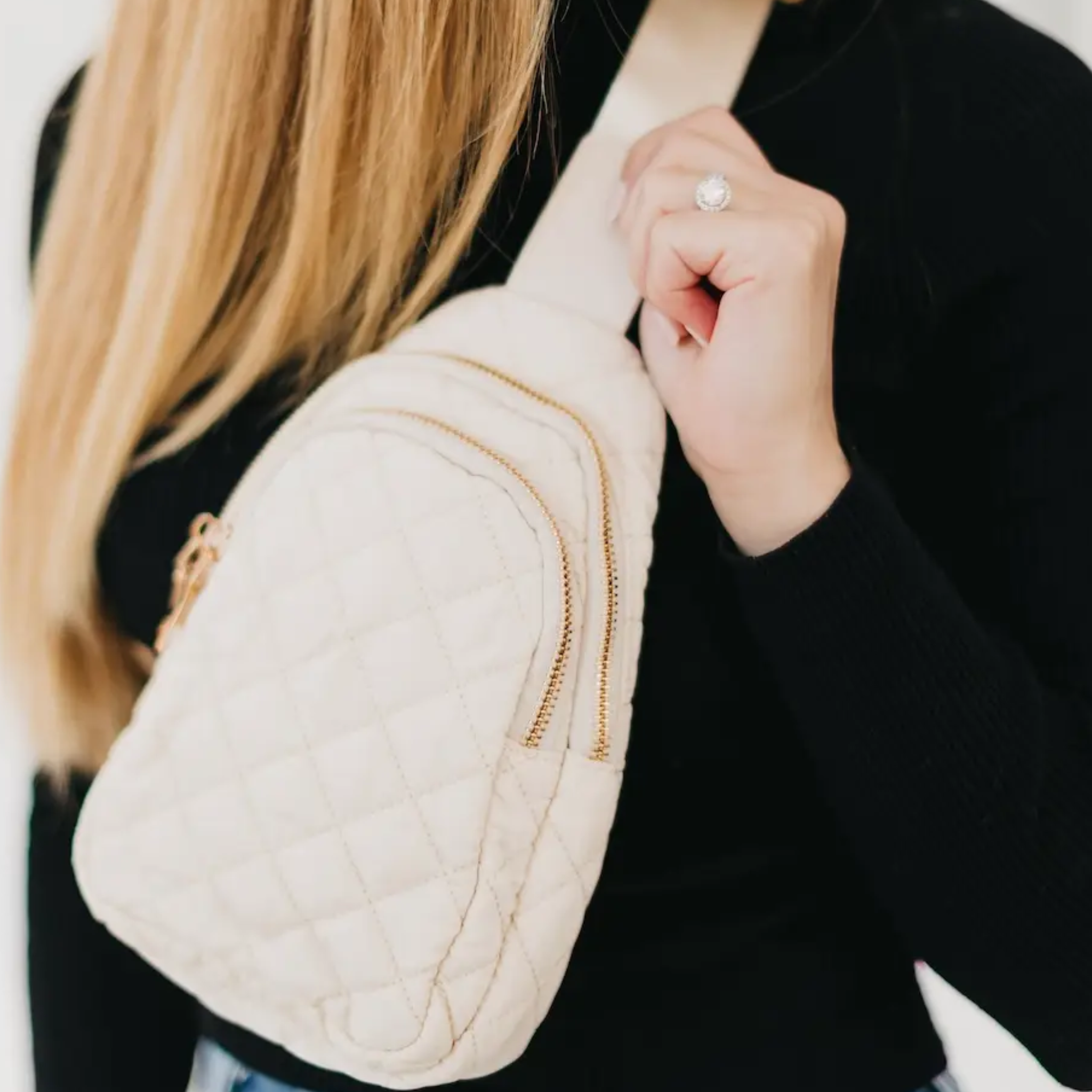 Black Pretty Simple Pinelope Puffer Bum Bag with quilted design and adjustable strap displayed on a white background.