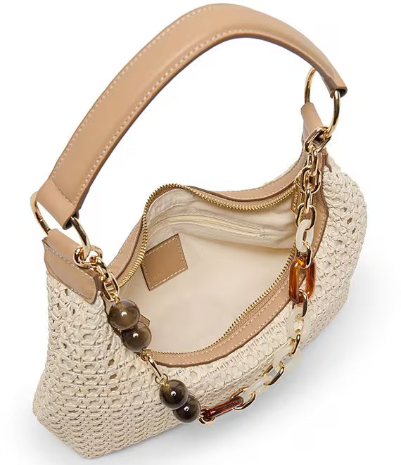 Dolce Vita Poppie woven chain charm shoulder bag with stylish design and textured woven pattern, featuring chain strap details.