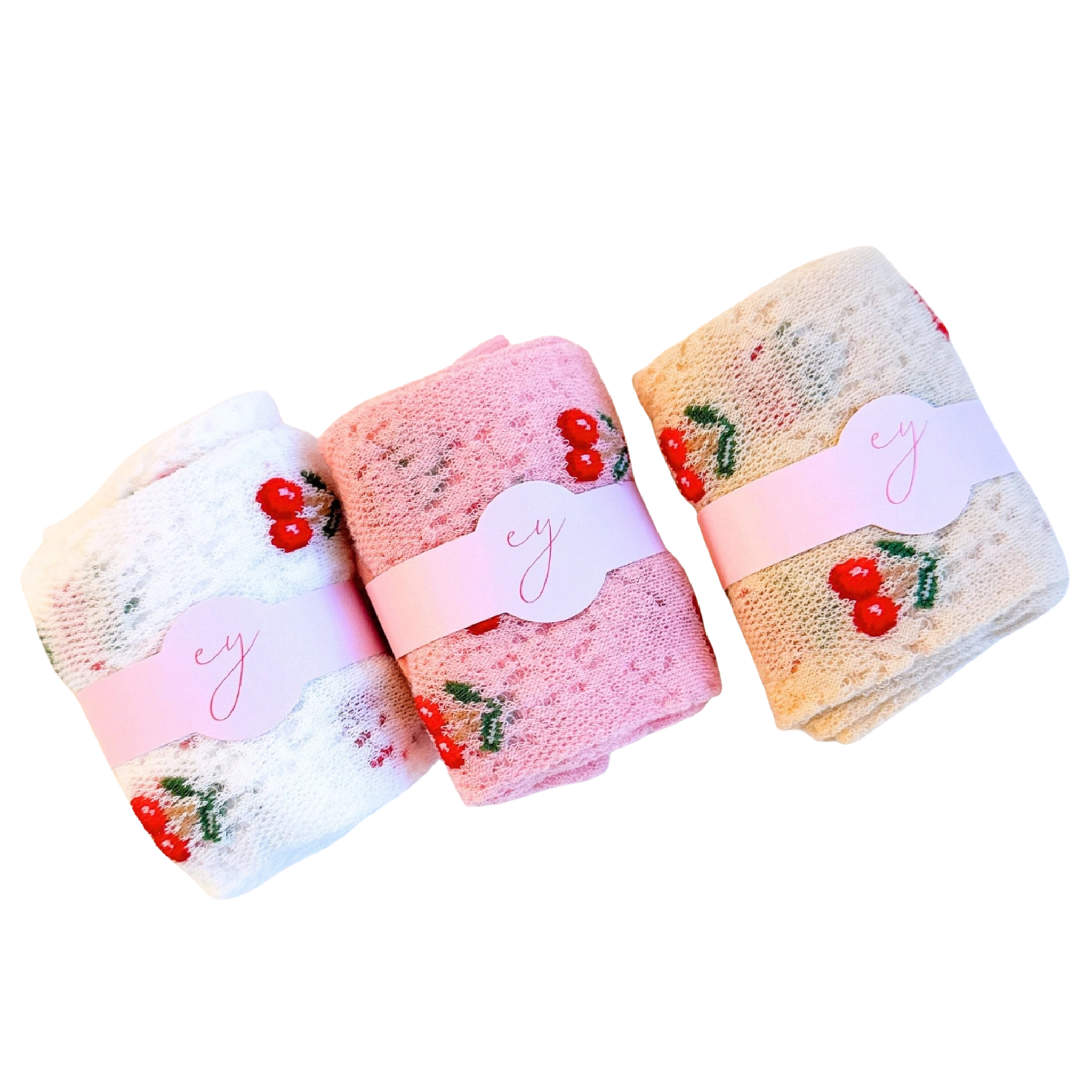 Set of three Ellison + Young Cherry Vibe socks featuring playful patterns and vibrant colors in a cozy, stylish design.