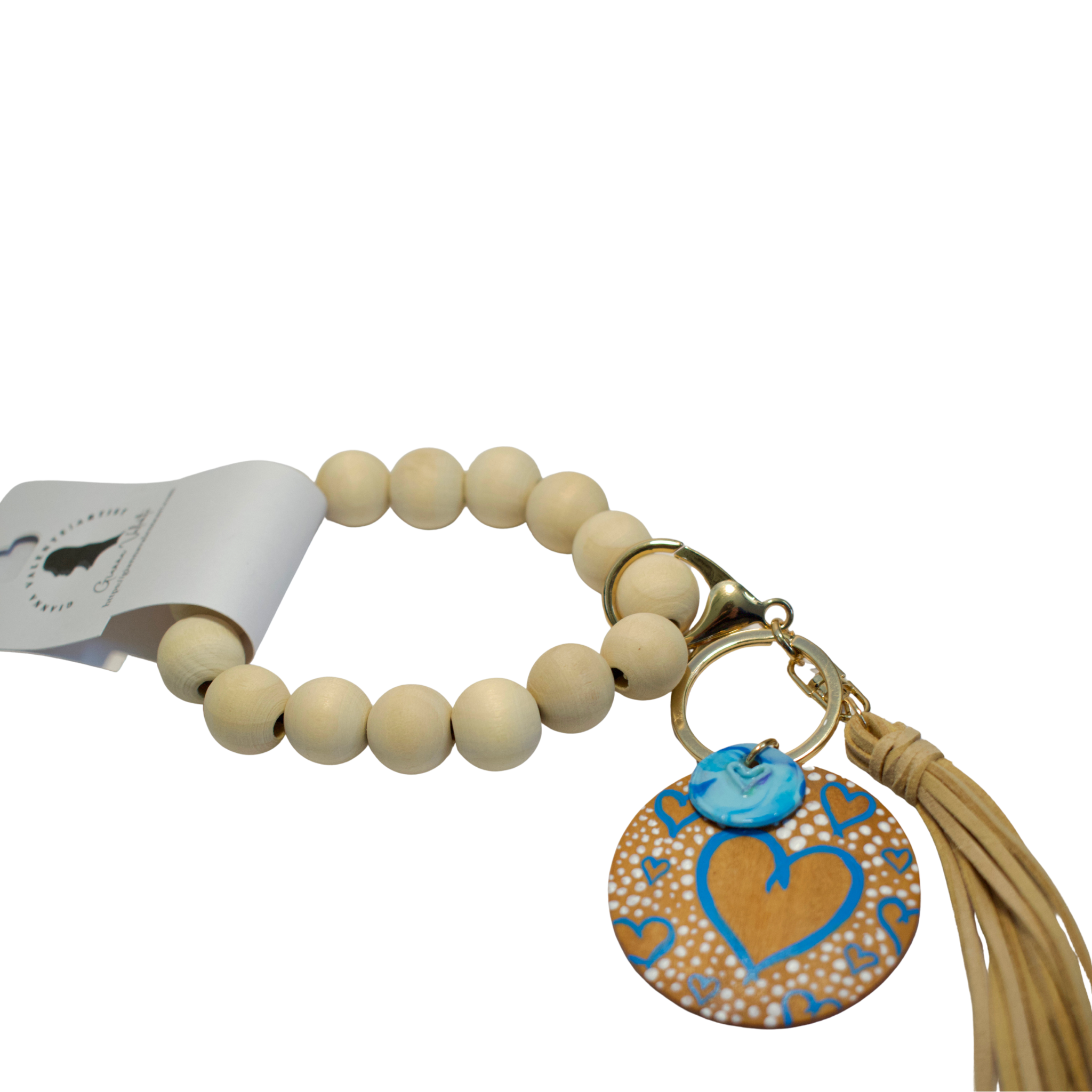 Hand-painted ceramic key chain featuring a heart and bow design by Gianna Valente for Lets Bag It.