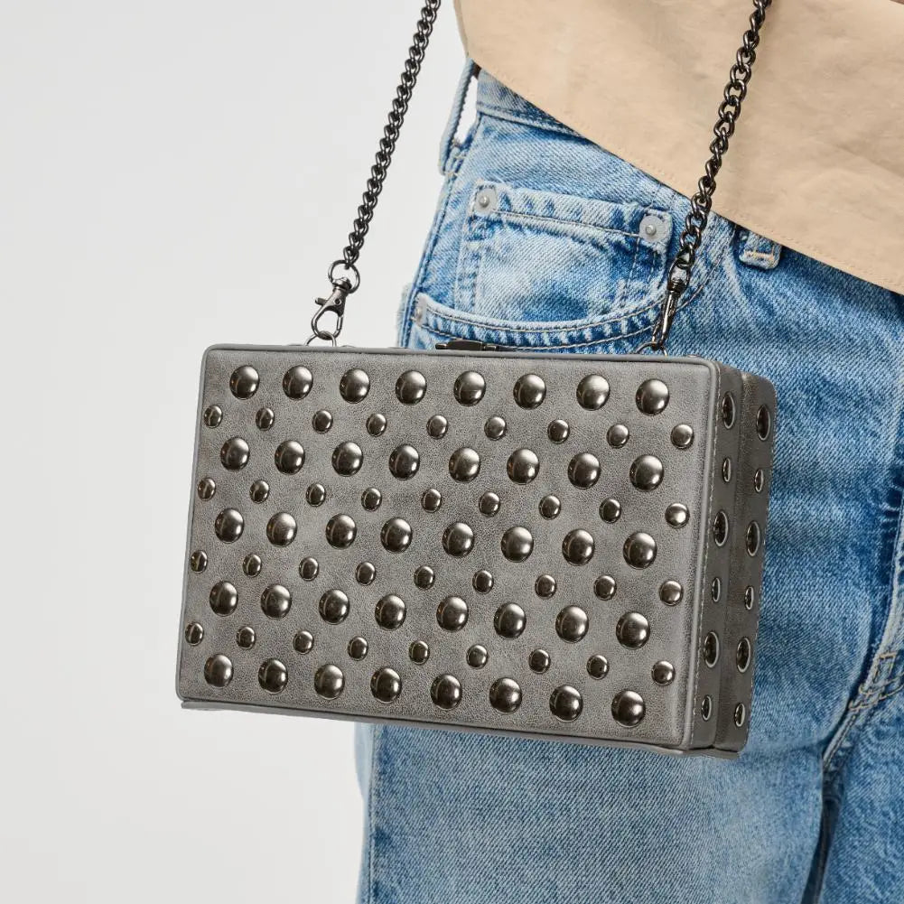 Urban Expressions Desi studded clutch bag with intricate embellishments and a stylish design in a close-up view.
