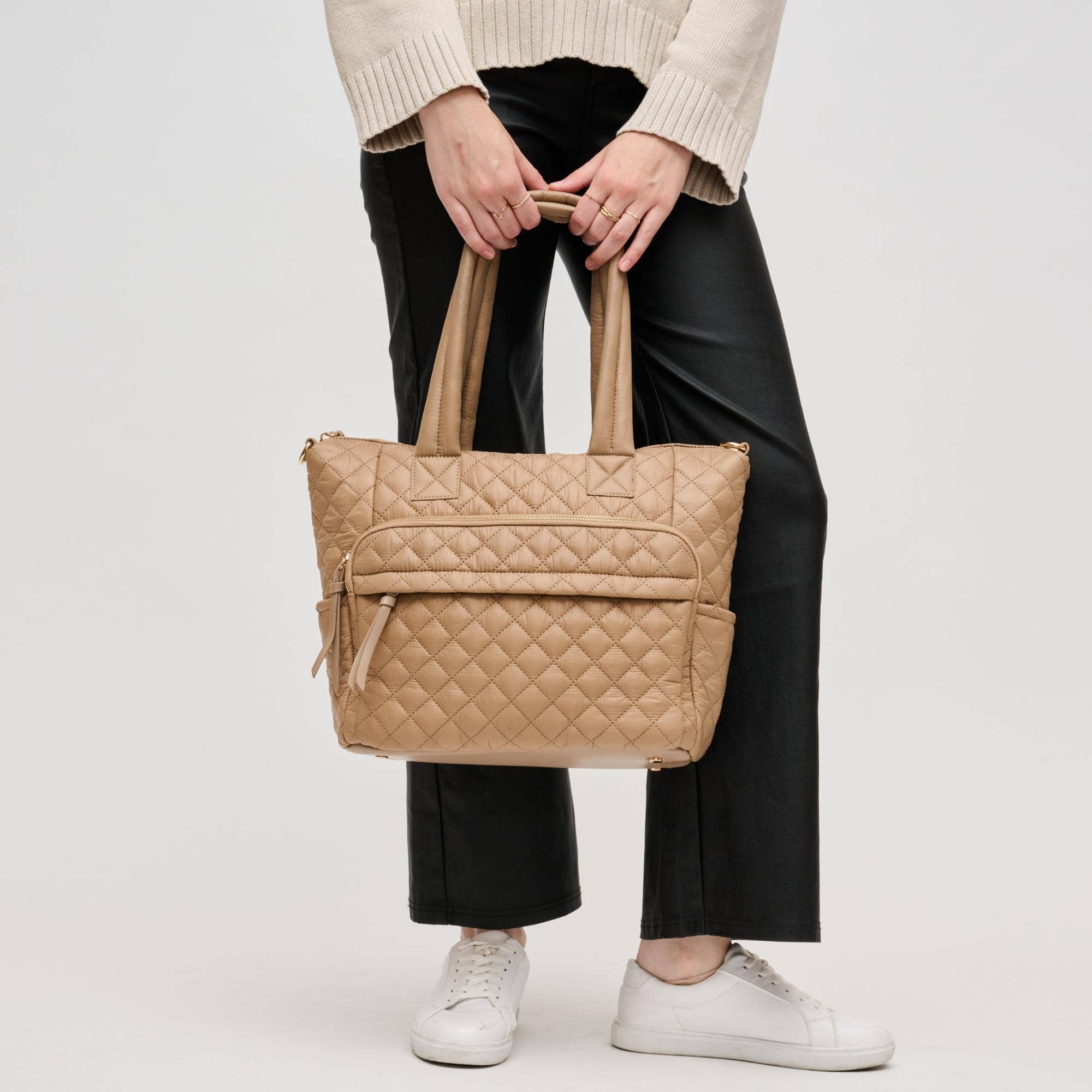 Urban Expressions Jayna quilted nylon tote in black with stylish handles and spacious interior.
