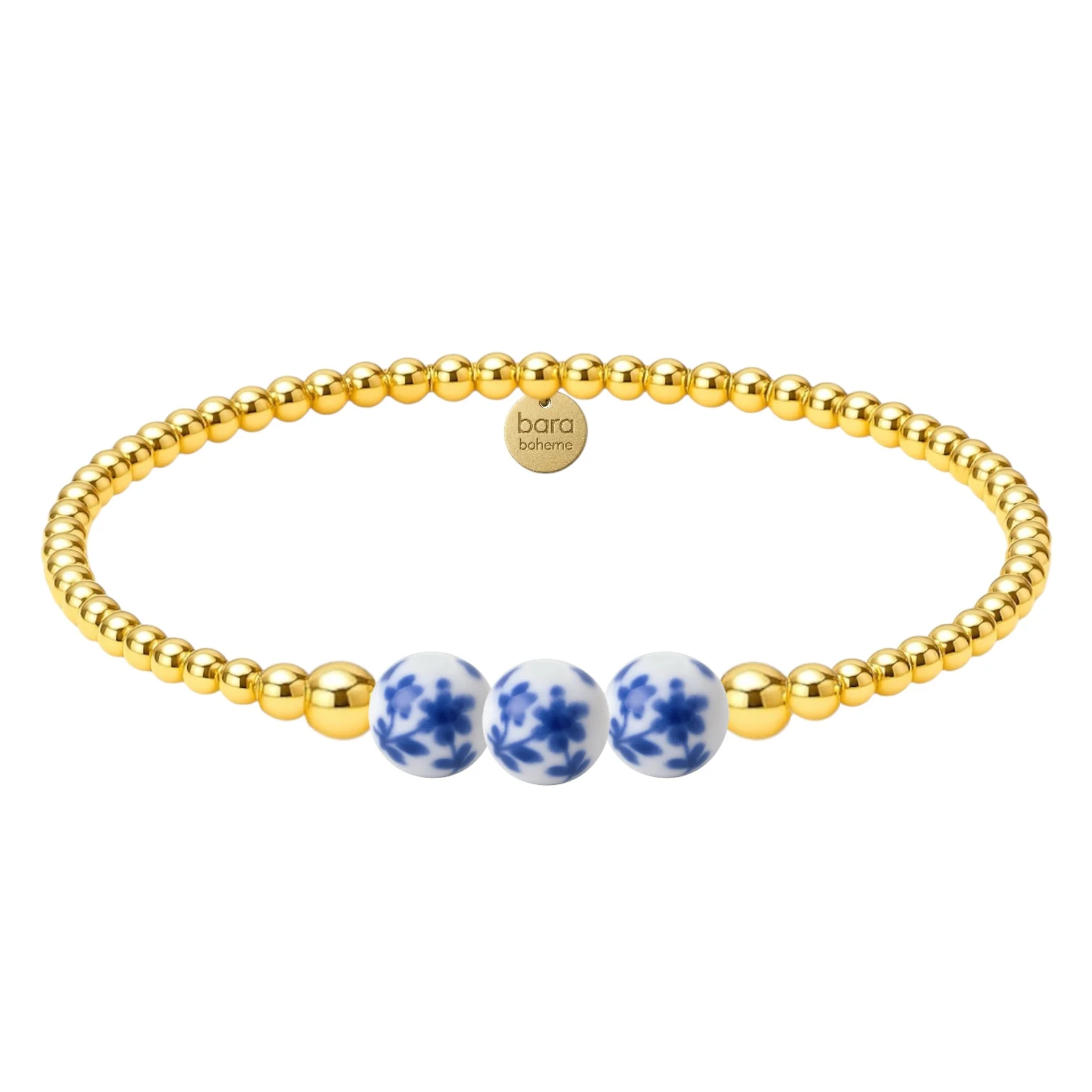 Magnolia gold filled beaded bracelet by BARA BOHEME featuring delicate porcelain beads on a stylish design.
