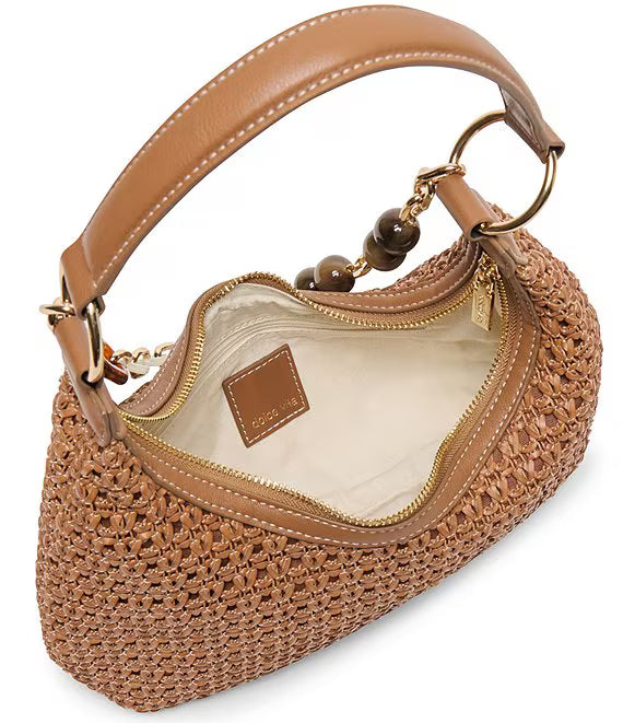 Dolce Vita Poppie woven chain charm shoulder bag with stylish design, featuring woven texture and chain strap, on a plain background.